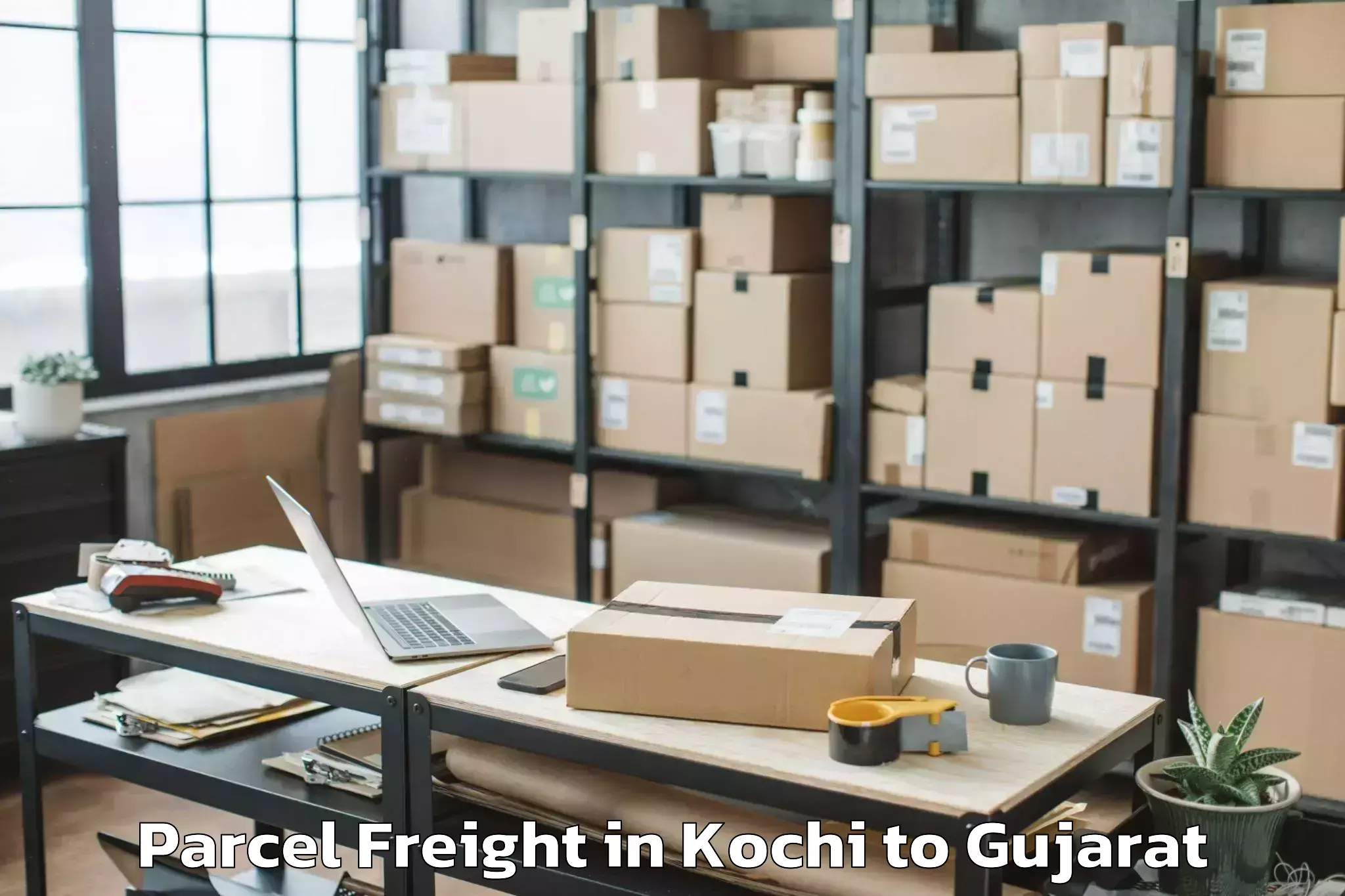 Top Kochi to Jetpur Parcel Freight Available